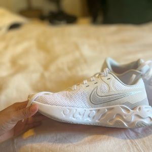 Brand New white “Nike renew”tennis shoe, did not fit me.